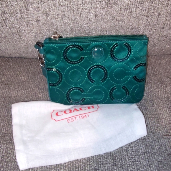 Coach Handbags - Vintage Coach wristlet in great condition no callouts
